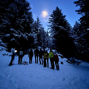 Trekking al chiaro di luna con cena in rifugio e slittata